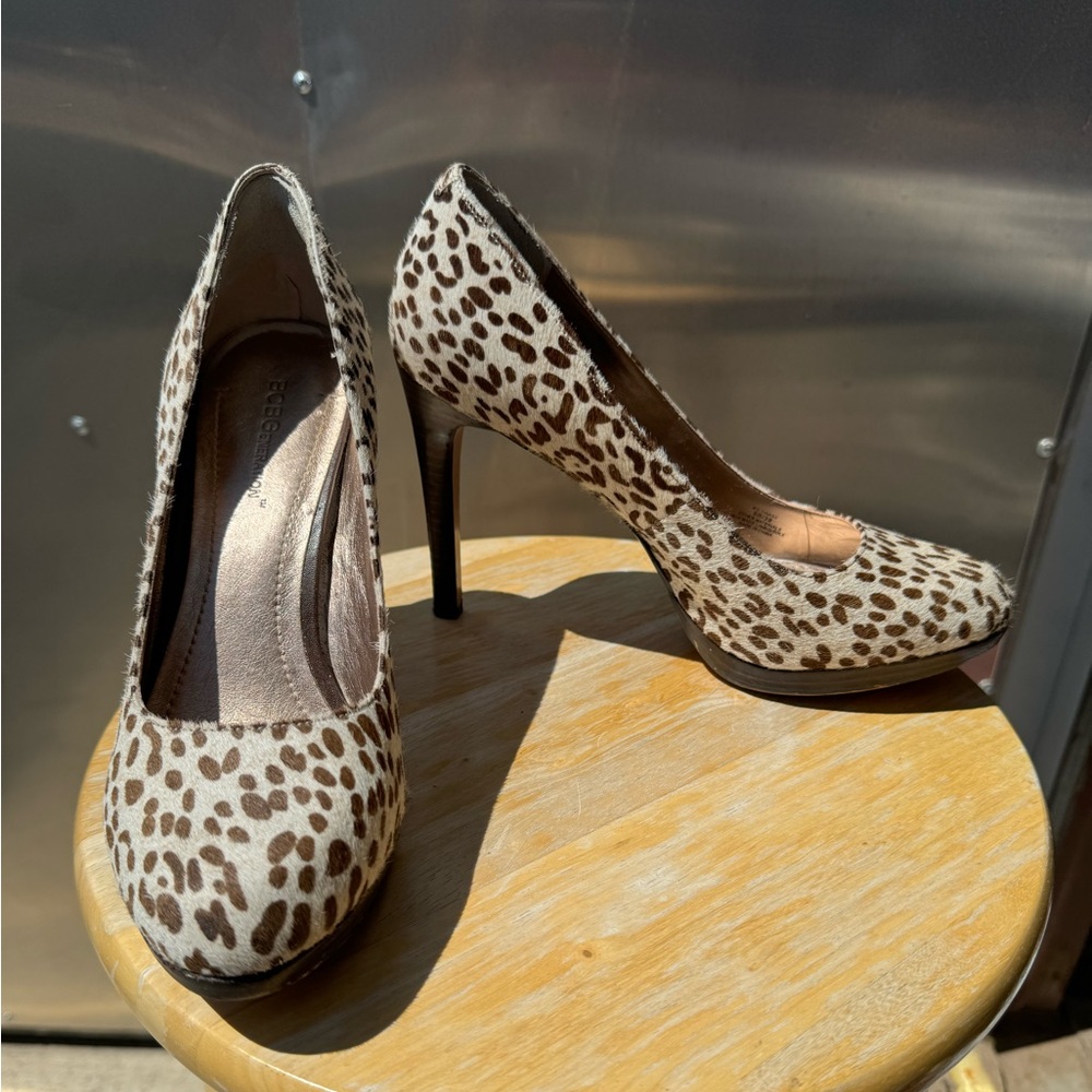 Women’s size 9B Faux fur BCBG platform heels.  Wood pattern heel.